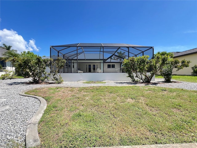 2526 Brazilia Ct, Punta Gorda, FL 33950 - back of property featuring a yard and glass enclosure