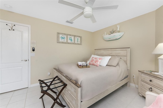 26254 Stillwater Cir, Punta Gorda, FL 33955 - bedroom with light tile patterned flooring and ceiling fan