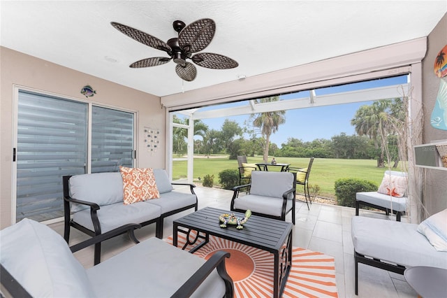 26254 Stillwater Cir, Punta Gorda, FL 33955 - sunroom featuring an outdoor living space and a ceiling fan