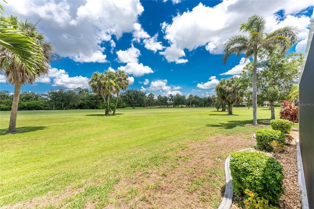 26254 Stillwater Cir, Punta Gorda, FL 33955 - view of green lawn with view of wooded area and golf course view