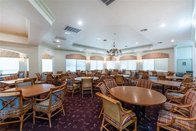 26254 Stillwater Cir, Punta Gorda, FL 33955 - dining area featuring a raised ceiling, healthy amount of natural light, carpet floors, and recessed lighting