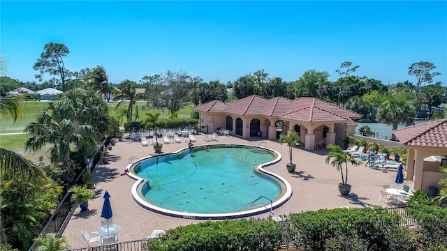 26254 Stillwater Cir, Punta Gorda, FL 33955 - community pool featuring a patio area