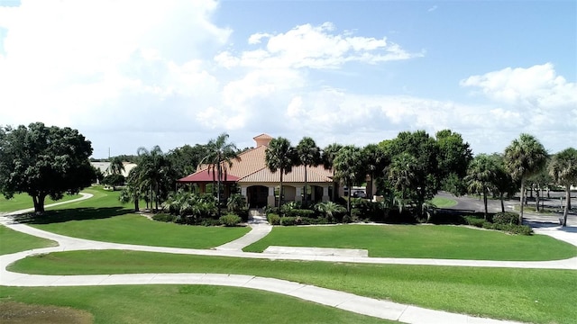 26254 Stillwater Cir, Punta Gorda, FL 33955 - view of home's community with a lawn