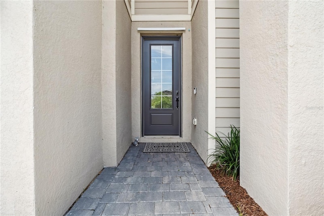 11105 Balfour St E, Venice, FL 34293 - property entrance with stucco siding