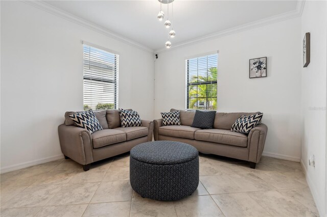 11105 Balfour St E, Venice, FL 34293 - living room featuring crown molding and baseboards