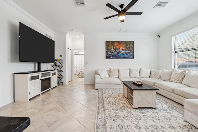 11105 Balfour St E, Venice, FL 34293 - living area featuring a ceiling fan, ornamental molding, and light tile patterned floors