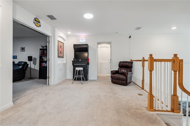 11105 Balfour St E, Venice, FL 34293 - sitting room featuring carpet flooring, an upstairs landing, and recessed lighting