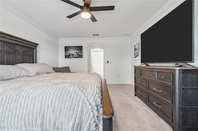11105 Balfour St E, Venice, FL 34293 - bedroom with light carpet, crown molding, arched walkways, and ceiling fan