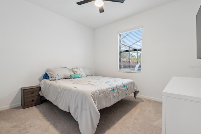 11105 Balfour St E, Venice, FL 34293 - bedroom featuring light carpet and ceiling fan