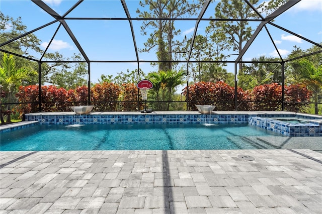11105 Balfour St E, Venice, FL 34293 - view of swimming pool featuring glass enclosure, a pool with connected hot tub, and a patio area