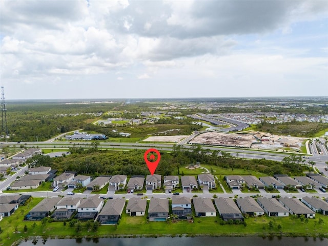 11105 Balfour St E, Venice, FL 34293 - aerial view of property and surrounding area with nearby suburban area and a nearby body of water
