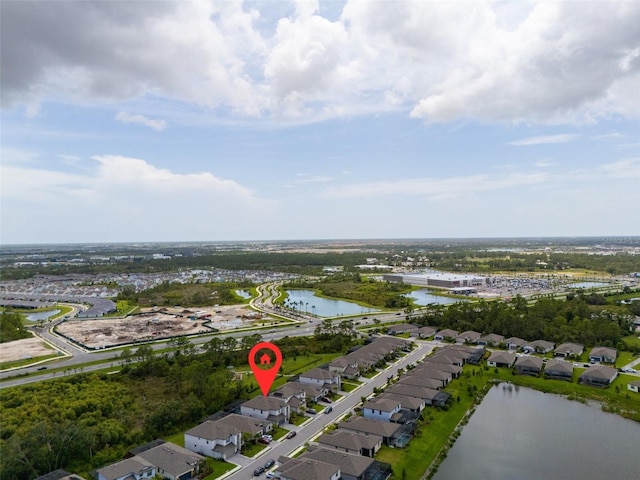 11105 Balfour St E, Venice, FL 34293 - aerial view of property and surrounding area featuring a large body of water and nearby suburban area