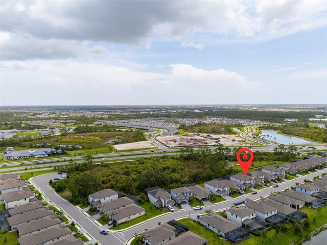 11105 Balfour St E, Venice, FL 34293 - aerial view of property's location with nearby suburban area and a nearby body of water