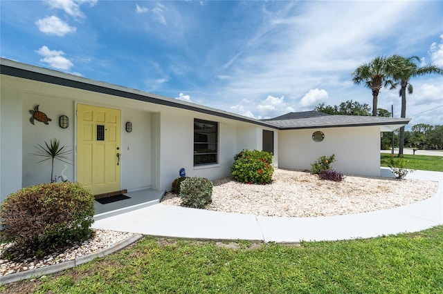 4051 Rock Creek Dr, Port Charlotte, FL 33948 - view of front of house featuring stucco siding