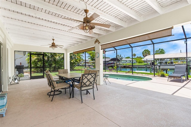 4051 Rock Creek Dr, Port Charlotte, FL 33948 - sunroom / solarium featuring beamed ceiling, a ceiling fan, a swimming pool, a water view, and plenty of natural light