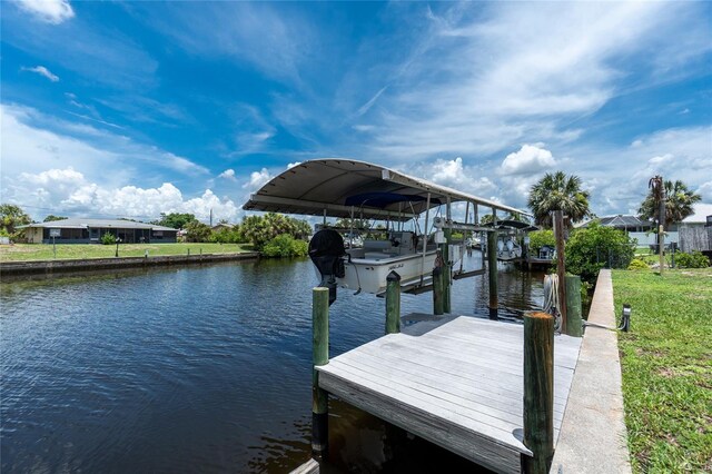 4051 Rock Creek Dr, Port Charlotte, FL 33948 - dock area featuring a water view and boat lift