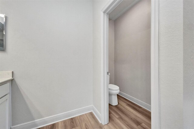 16848 Canopy Garden Dr, Port Charlotte, FL 33953 - bathroom featuring wood finished floors and vanity