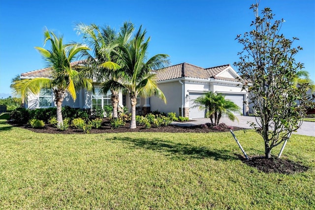 14436 Ponce De Leon Trl, Port Charlotte, FL 33981 - mediterranean / spanish home with a tiled roof, an attached garage, stucco siding, a front lawn, and driveway