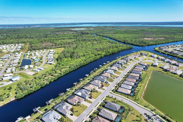 14436 Ponce De Leon Trl, Port Charlotte, FL 33981 - aerial overview of property's location featuring a large body of water and nearby suburban area