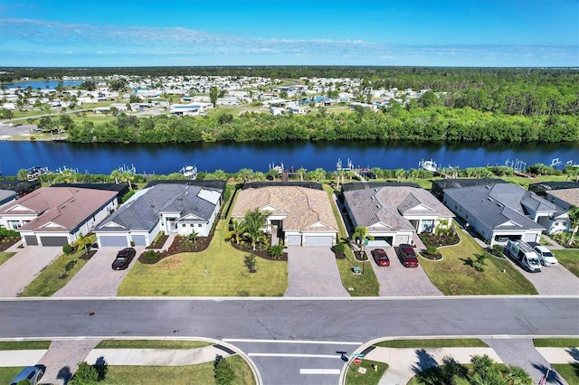 14436 Ponce De Leon Trl, Port Charlotte, FL 33981 - aerial perspective of suburban area featuring a large body of water