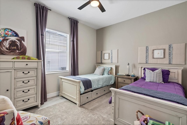 14436 Ponce De Leon Trl, Port Charlotte, FL 33981 - bedroom with multiple windows, light tile patterned floors, and ceiling fan