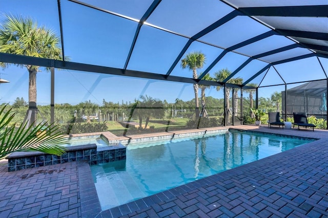 14436 Ponce De Leon Trl, Port Charlotte, FL 33981 - view of swimming pool featuring a patio area, a lanai, and a pool with connected hot tub