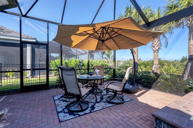 14436 Ponce De Leon Trl, Port Charlotte, FL 33981 - view of patio featuring glass enclosure and outdoor dining space