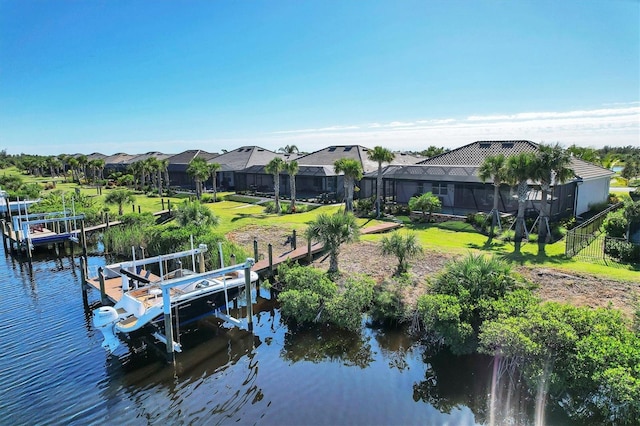 14436 Ponce De Leon Trl, Port Charlotte, FL 33981 - dock featuring boat lift, a water view, and a residential view