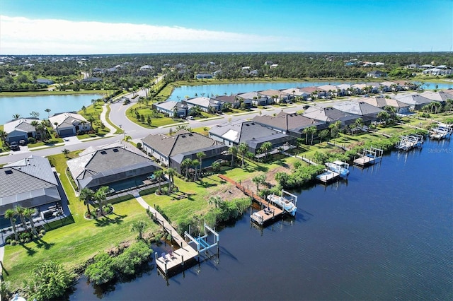 14436 Ponce De Leon Trl, Port Charlotte, FL 33981 - aerial perspective of suburban area featuring a nearby body of water and a tree filled landscape