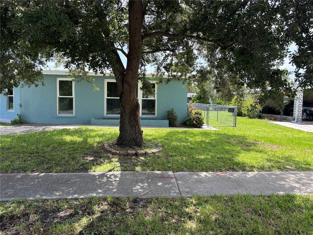 2513 Ambrose Ln, Port Charlotte, FL 33952 - view of front of property featuring stucco siding