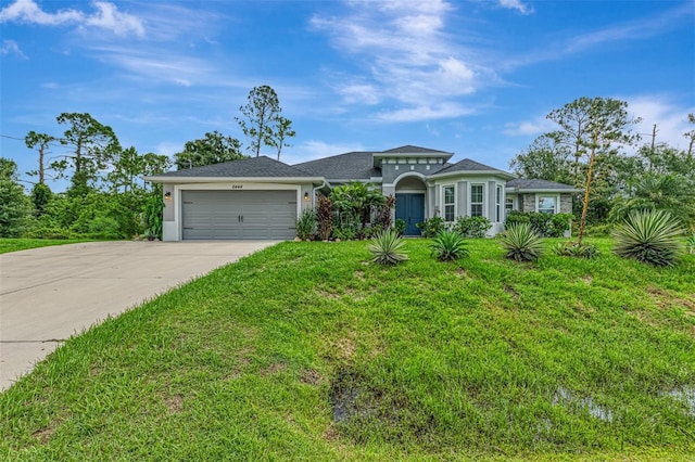 6444 Alhambra Ave, North Port, FL 34291 - view of front facade featuring driveway, an attached garage, a front lawn, and stucco siding