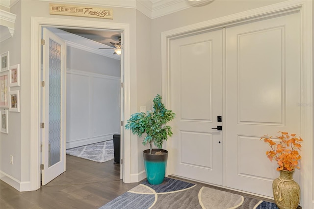 6444 Alhambra Ave, North Port, FL 34291 - foyer entrance with dark wood finished floors, crown molding, a ceiling fan, and a decorative wall