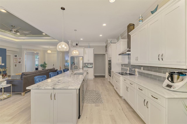 6444 Alhambra Ave, North Port, FL 34291 - kitchen featuring appliances with stainless steel finishes, crown molding, open floor plan, white cabinets, and recessed lighting