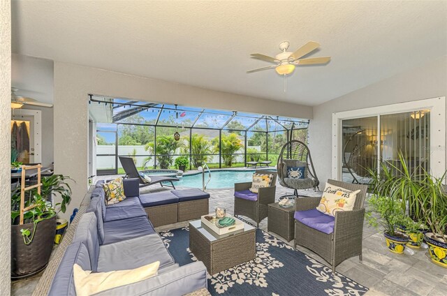 6444 Alhambra Ave, North Port, FL 34291 - view of patio with an outdoor hangout area, a ceiling fan, a pool with connected hot tub, and glass enclosure