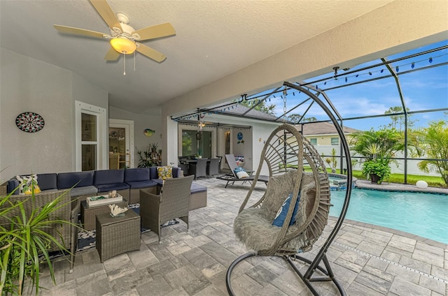 6444 Alhambra Ave, North Port, FL 34291 - view of patio with outdoor lounge area, a ceiling fan, a pool with connected hot tub, and glass enclosure