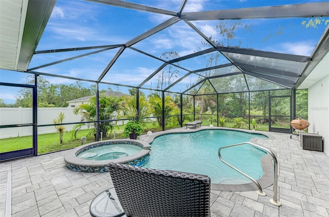 6444 Alhambra Ave, North Port, FL 34291 - view of pool featuring a patio area, a pool with connected hot tub, and glass enclosure