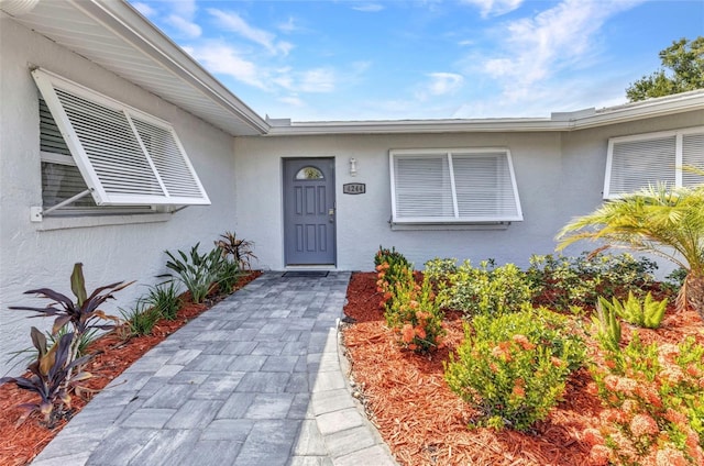 4244 Harbor Blvd, Port Charlotte, FL 33952 - view of exterior entry featuring stucco siding
