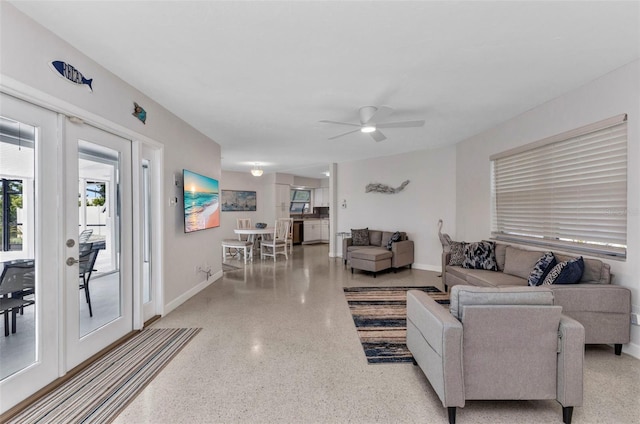 4244 Harbor Blvd, Port Charlotte, FL 33952 - living room featuring speckle patterned floor and a ceiling fan