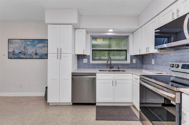 4244 Harbor Blvd, Port Charlotte, FL 33952 - kitchen with stainless steel appliances, tasteful backsplash, light countertops, white cabinets, and recessed lighting