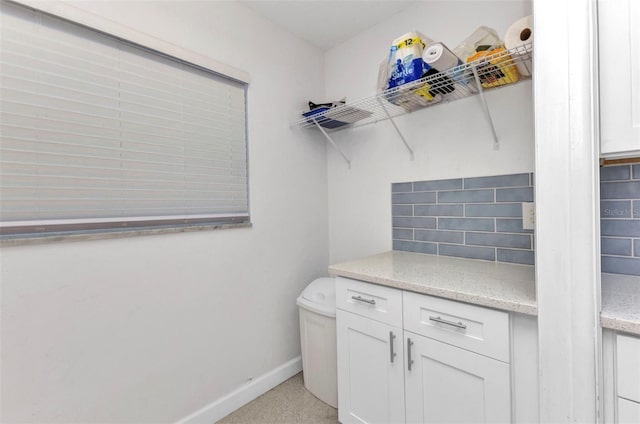 4244 Harbor Blvd, Port Charlotte, FL 33952 - washroom featuring baseboards