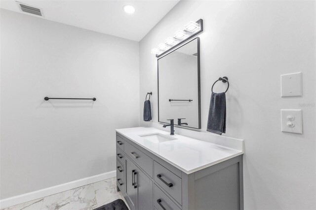 4244 Harbor Blvd, Port Charlotte, FL 33952 - bathroom with vanity, marble finish floors, and recessed lighting