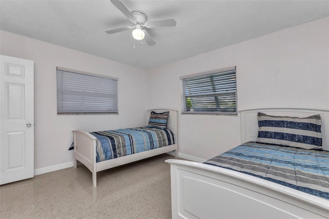 4244 Harbor Blvd, Port Charlotte, FL 33952 - bedroom featuring dark aggregate flooring and ceiling fan