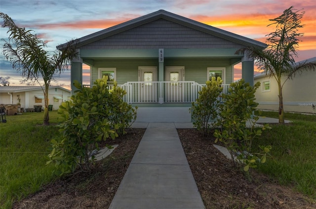 419 Carmalita St, Punta Gorda, FL 33950 - bungalow featuring a porch