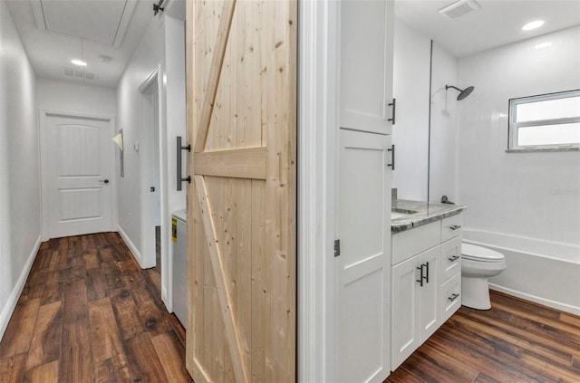419 Carmalita St, Punta Gorda, FL 33950 - bathroom featuring wood finished floors, tub / shower combination, and vanity