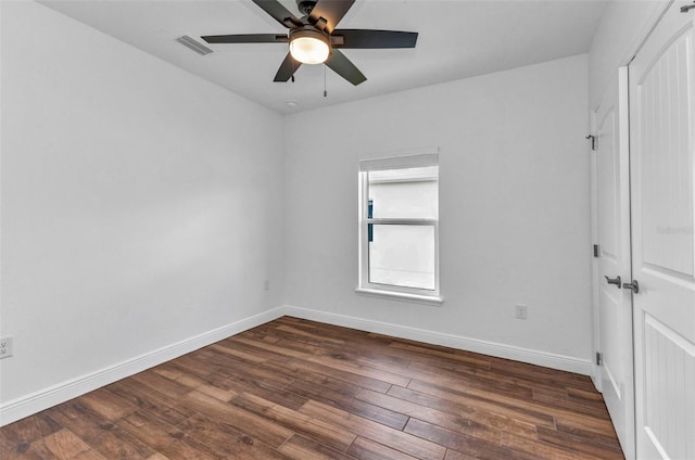 419 Carmalita St, Punta Gorda, FL 33950 - empty room with dark wood-style floors and ceiling fan