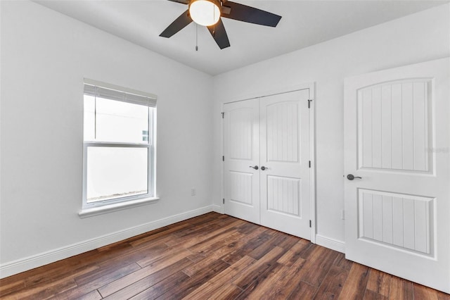 419 Carmalita St, Punta Gorda, FL 33950 - unfurnished bedroom featuring dark wood finished floors, a closet, and a ceiling fan