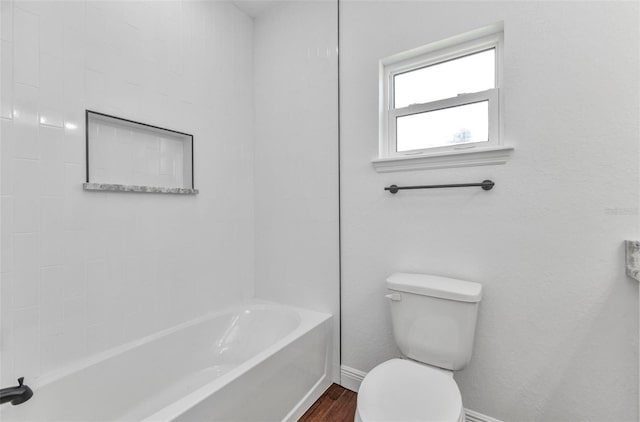 419 Carmalita St, Punta Gorda, FL 33950 - bathroom with wood finished floors and shower / bath combination