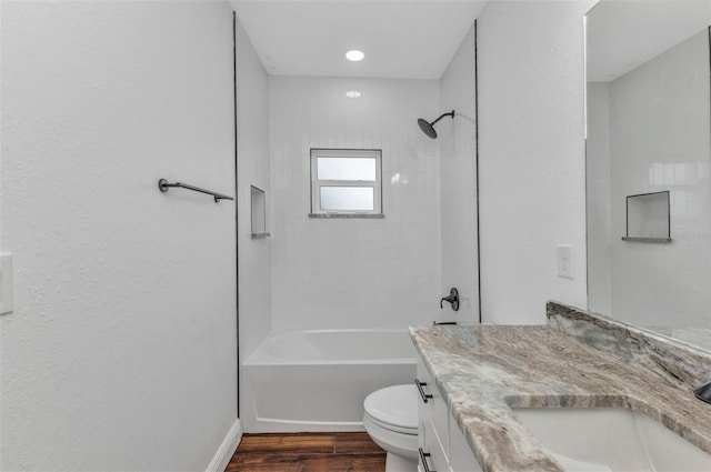 419 Carmalita St, Punta Gorda, FL 33950 - bathroom featuring vanity, wood finished floors, and washtub / shower combination