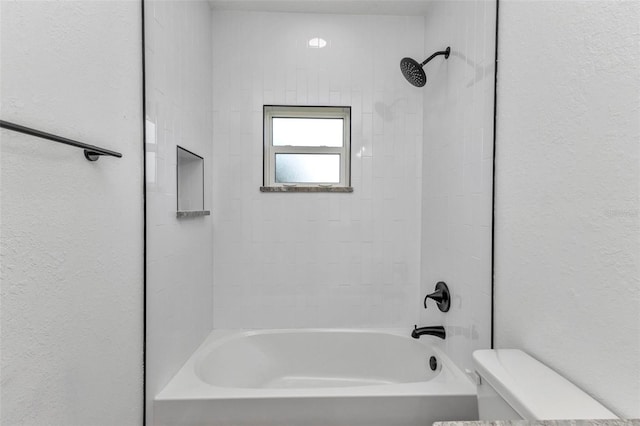 419 Carmalita St, Punta Gorda, FL 33950 - bathroom with bathing tub / shower combination and a textured wall