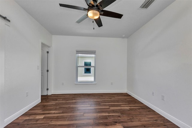 419 Carmalita St, Punta Gorda, FL 33950 - empty room featuring wood finished floors and a ceiling fan